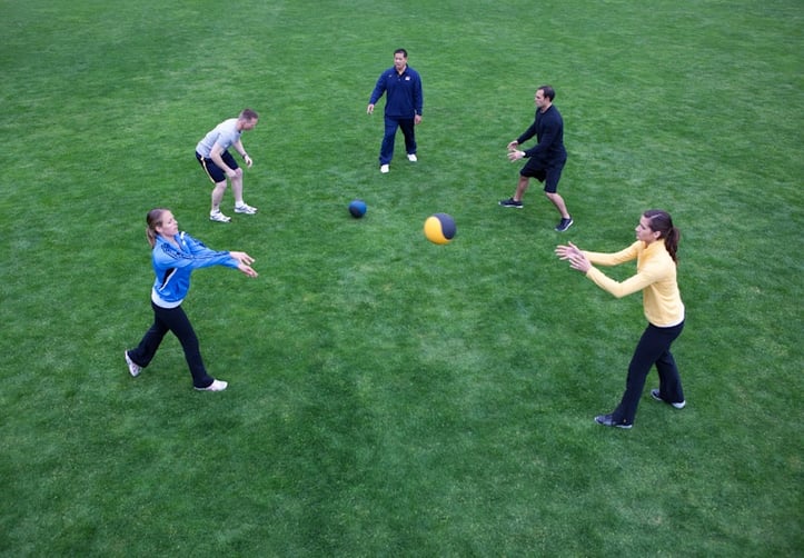 group of people playing outside