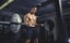 successful personal trainer business plan A man lifting weights in the gym