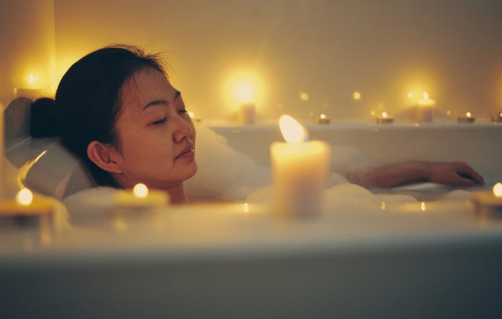 A women relaxing in the bath tub