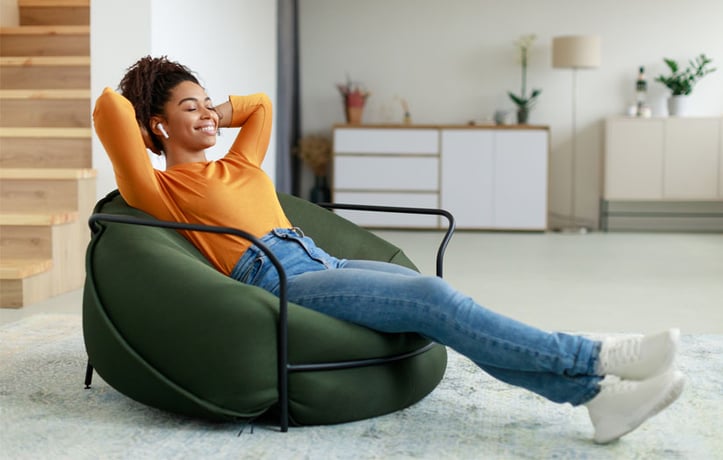 A Women Relaxing on a Chair