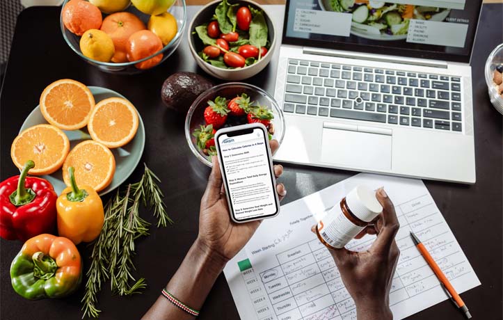 An individual using their phone for Diet tips