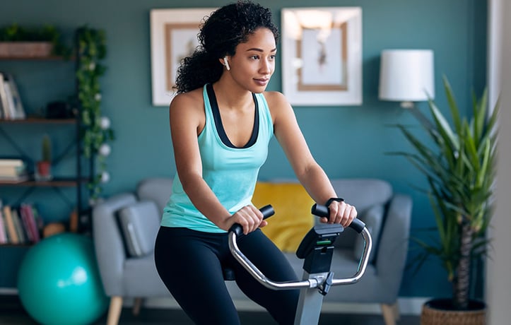 a woman on a stationary bike