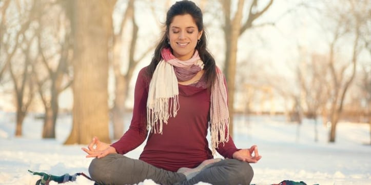 A Woman Meditating In the Park