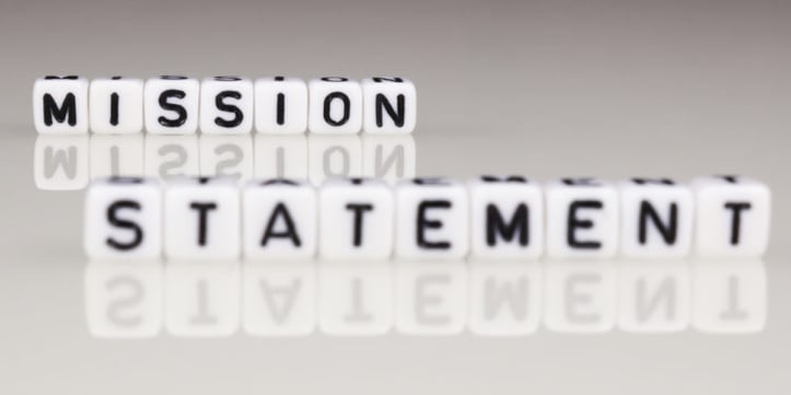 Small white blocks spelling out "Mission Statement"