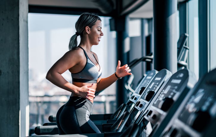 fit woman running on a treadmill