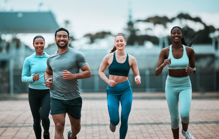 Man and women running